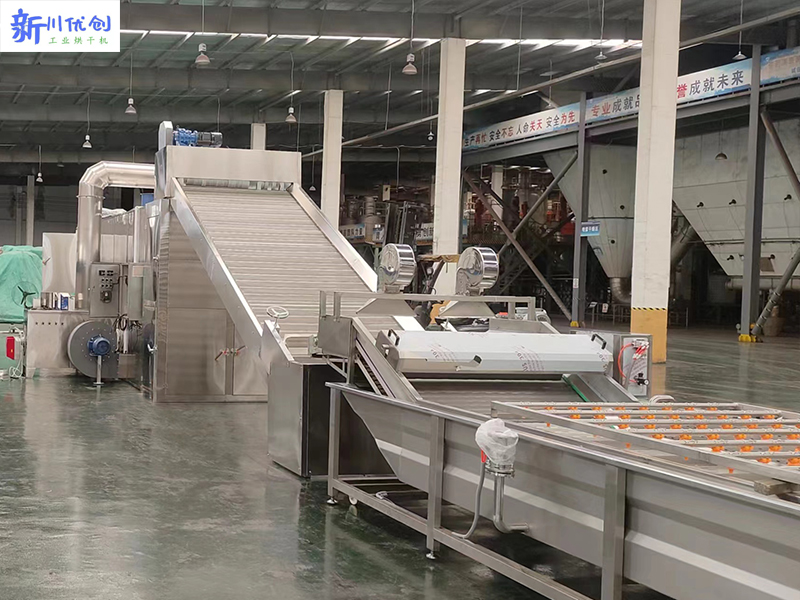 北京客戶訂購我廠一套網帶式烘干機烘干工業品